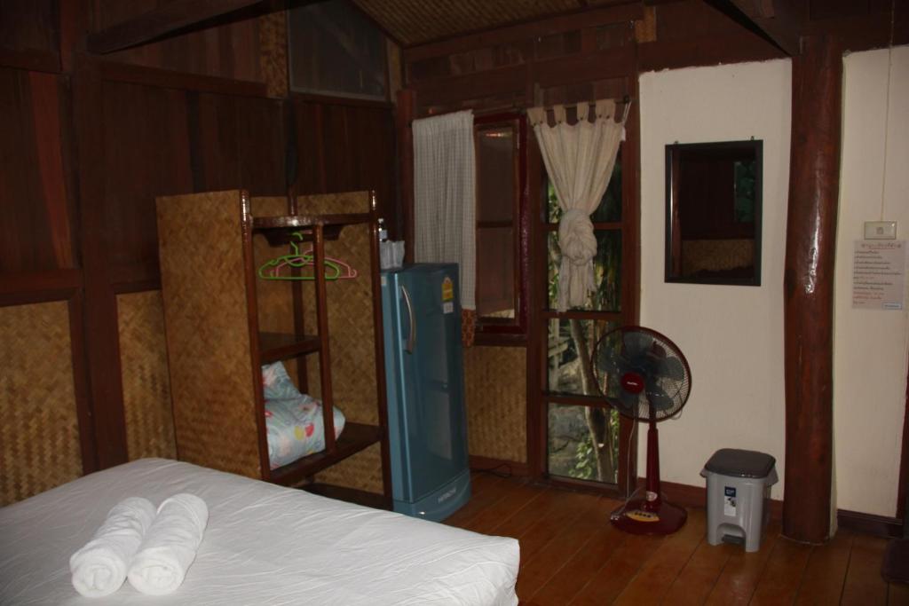 Postel nebo postele na pokoji v ubytování Aerie Lodge