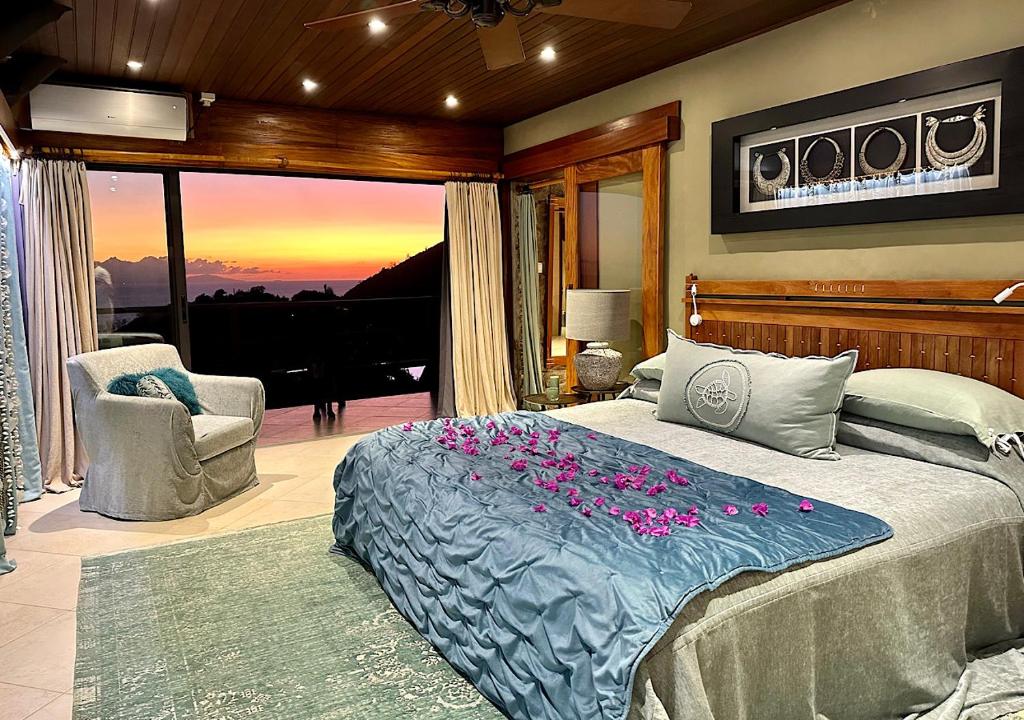 Postel nebo postele na pokoji v ubytování Château de feuilles & SPA - Praslin island