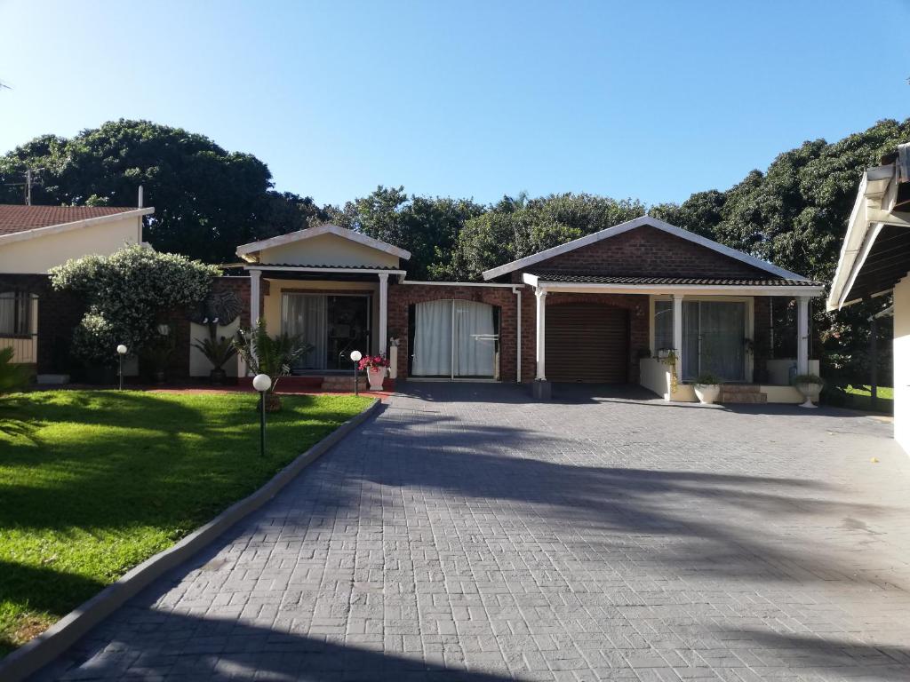 a driveway in front of a house at Edward Cabana in Margate