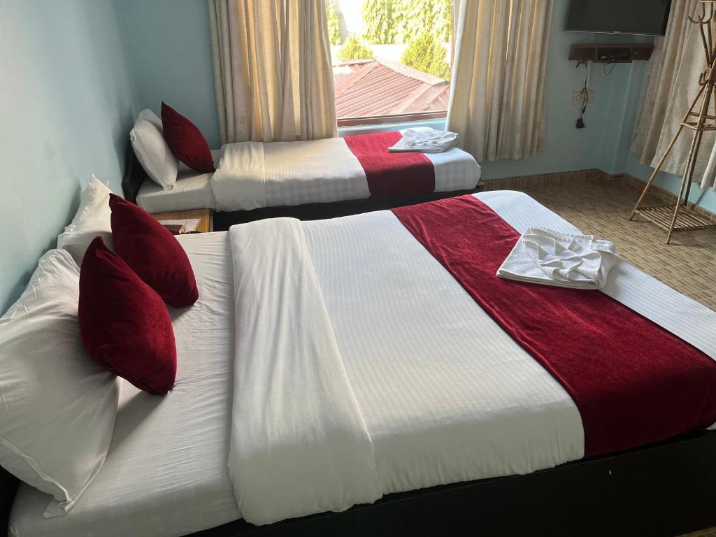 Letto o letti in una camera di The North Face Inn