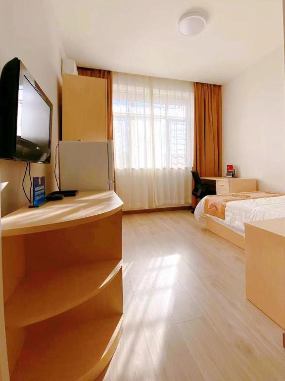 TV a/nebo společenská místnost v ubytování King Parkview Hotel