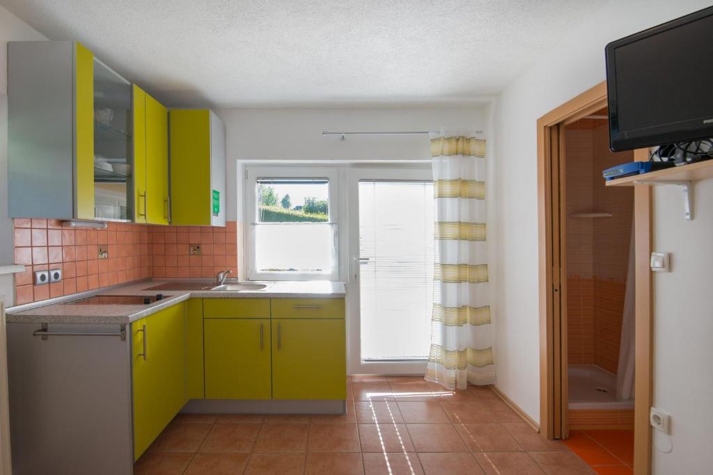 Kuchyň nebo kuchyňský kout v ubytování Ela Apartments - 2