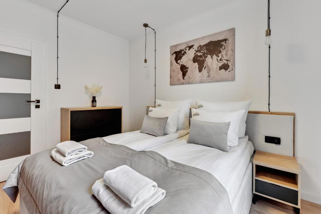 Posteľ alebo postele v izbe v ubytovaní Grano Residence - Pool, Sauna, SPA & Parking by Downtown Apartments