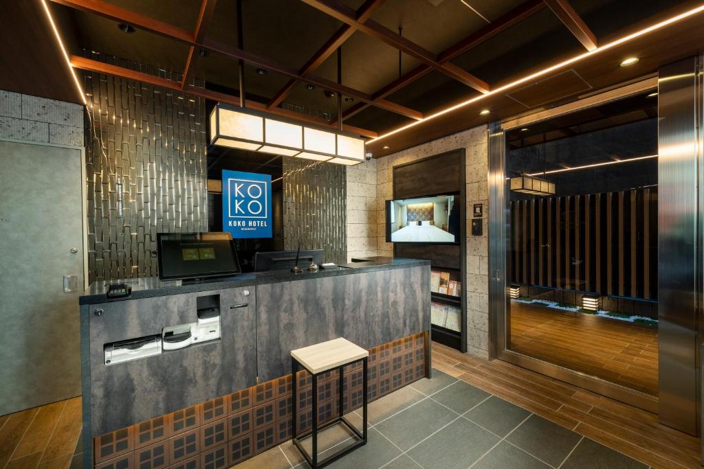 TV a/nebo společenská místnost v ubytování KOKO HOTEL Residence Asakusa Tawaramachi