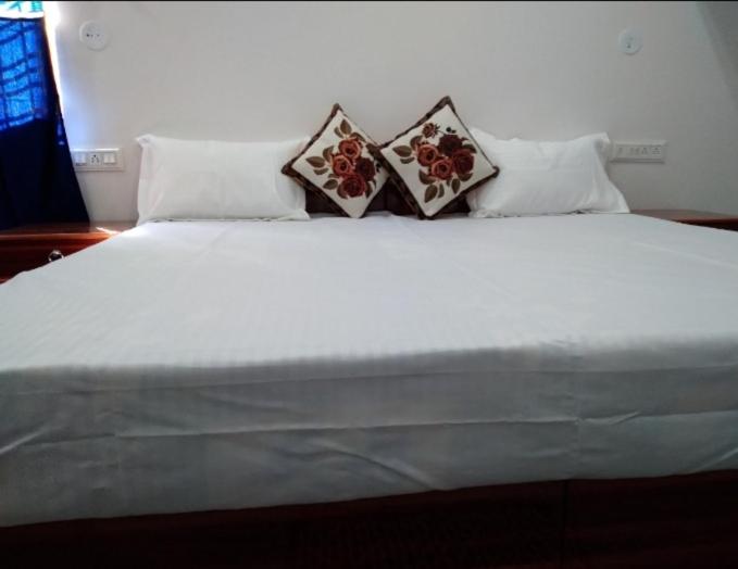 Postel nebo postele na pokoji v ubytování Planet home stay