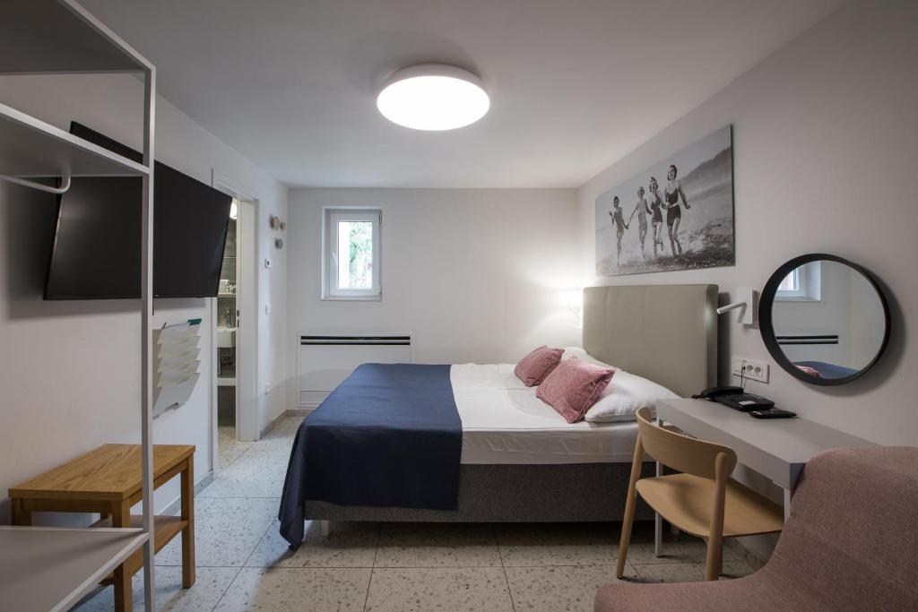 Letto o letti in una camera di Holiday Park Vile - Terme Krka