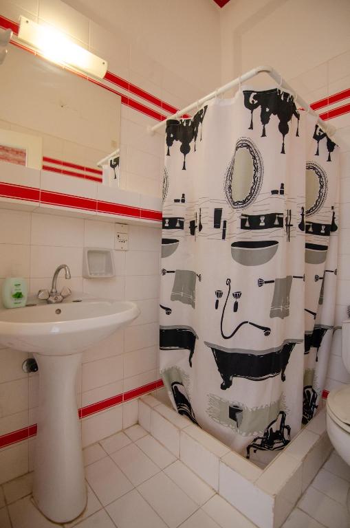 Koupelna v ubytování Almira Inn