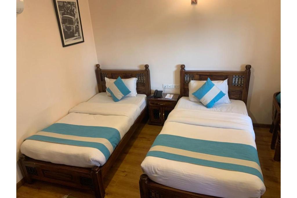 Postel nebo postele na pokoji v ubytování Hotel Tapas