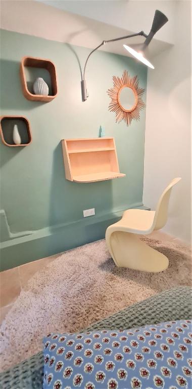Ein Sitzbereich in der Unterkunft Villa Aigarden maison d&#39;hôtes