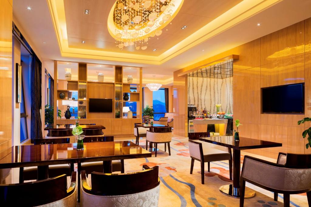 TV a/nebo společenská místnost v ubytování Wanda Realm Guangzhou Zengcheng