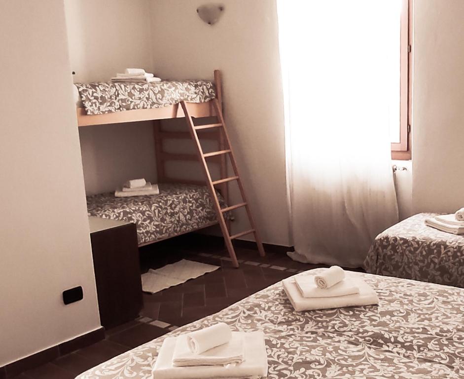Postel nebo postele na pokoji v ubytování 106 gradini