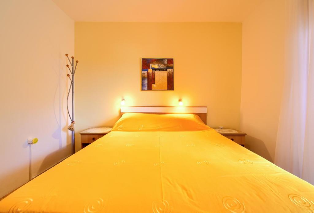 Postel nebo postele na pokoji v ubytování Apartment Ljerka