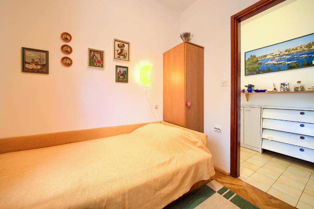Postel nebo postele na pokoji v ubytování Apartment Ljerka