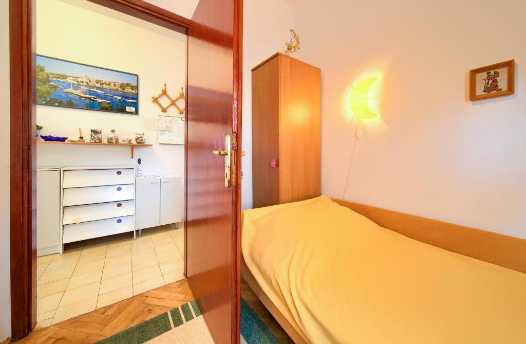 Postel nebo postele na pokoji v ubytování Apartment Ljerka