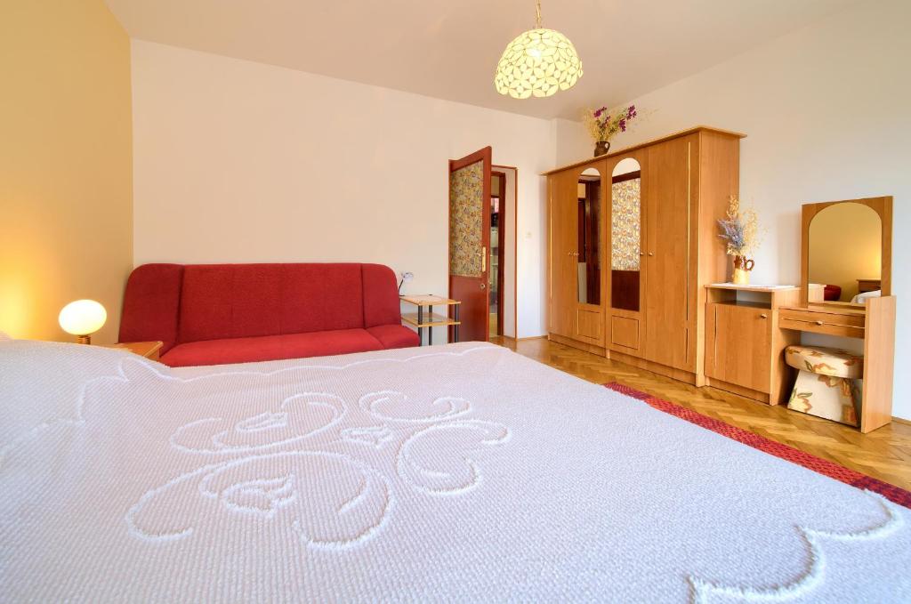 Postel nebo postele na pokoji v ubytování Apartment Ljerka
