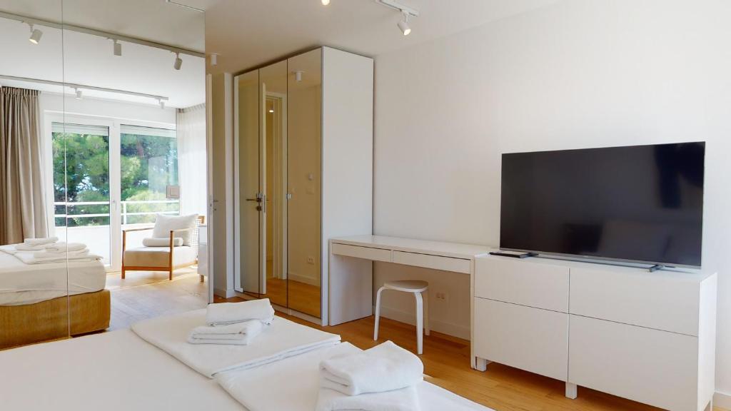 Postel nebo postele na pokoji v ubytování Villa Zoe Suites