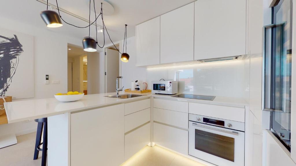 Kuchyň nebo kuchyňský kout v ubytování Villa Zoe Suites