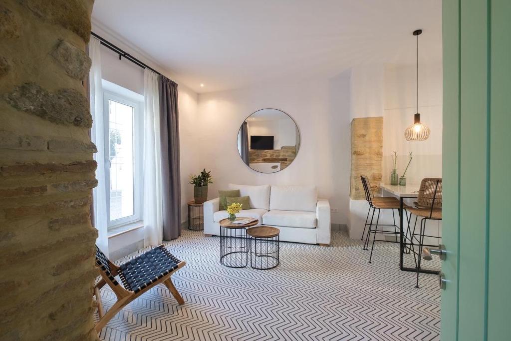 Posezení v ubytování Apartamentos Los Patios de la Judería