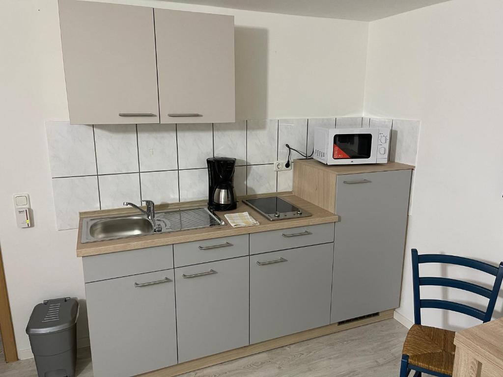 Kuchyň nebo kuchyňský kout v ubytování Ferienwohnung Weidner