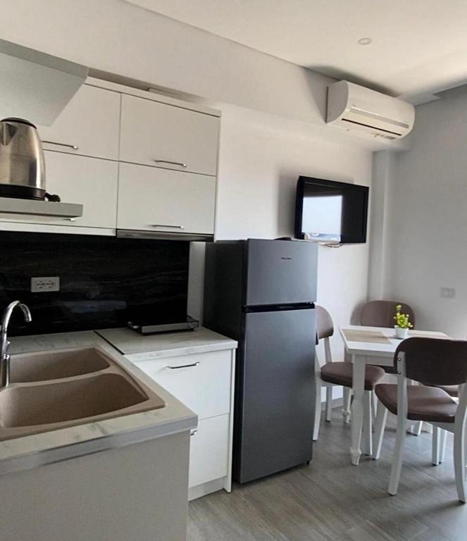 Kuchyň nebo kuchyňský kout v ubytování Edina by Hp Hotel