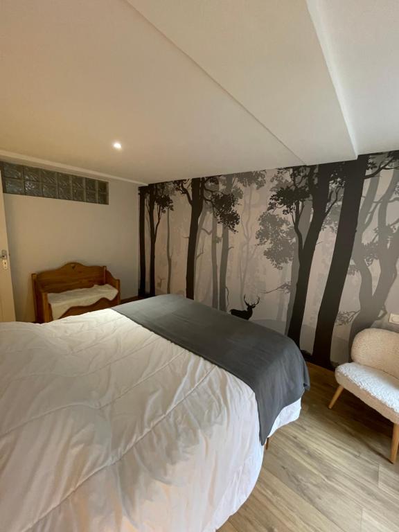 Posteľ alebo postele v izbe v ubytovaní LE LOFT et le T2, Le Mont Dore, au pied de La Dordogne