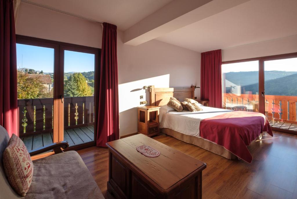 Postel nebo postele na pokoji v ubytování Hotel Calitxo