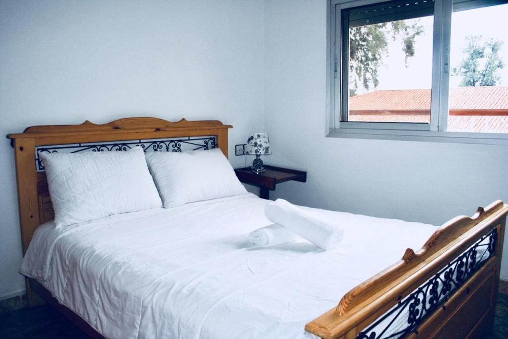 Ένα ή περισσότερα κρεβάτια σε δωμάτιο στο CASANASSIM