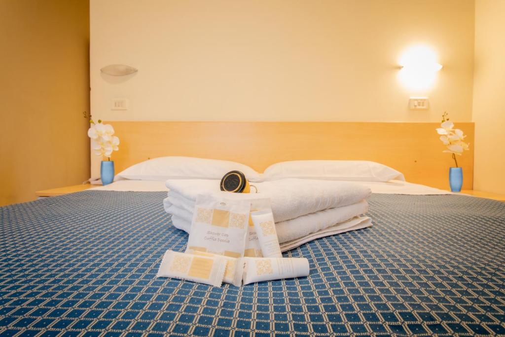 Postel nebo postele na pokoji v ubytování Hotel Fantasy
