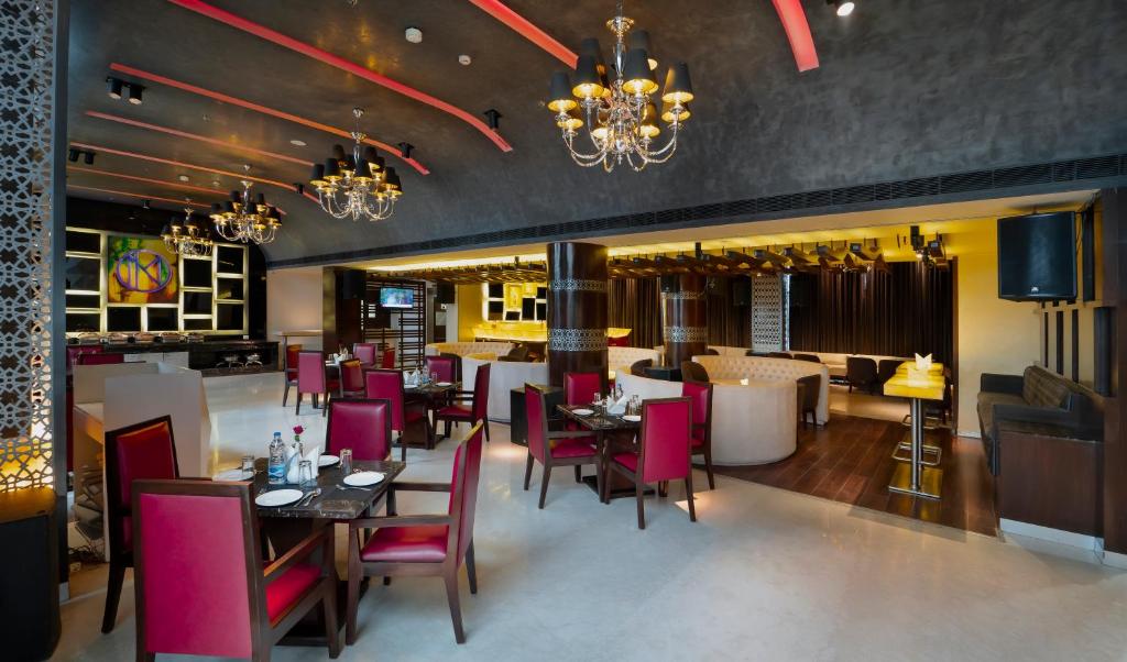 Posezení v ubytování Udman Hotel Chhattarpur
