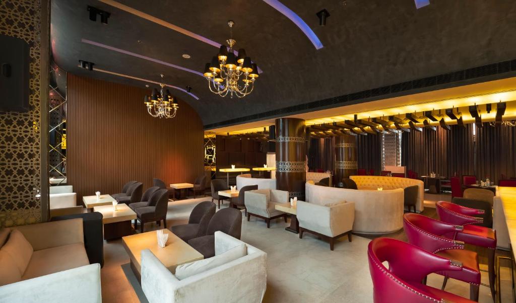Posezení v ubytování Udman Hotel Chhattarpur