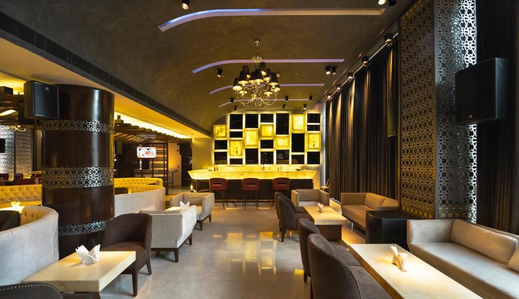 Posezení v ubytování Udman Hotel Chhattarpur