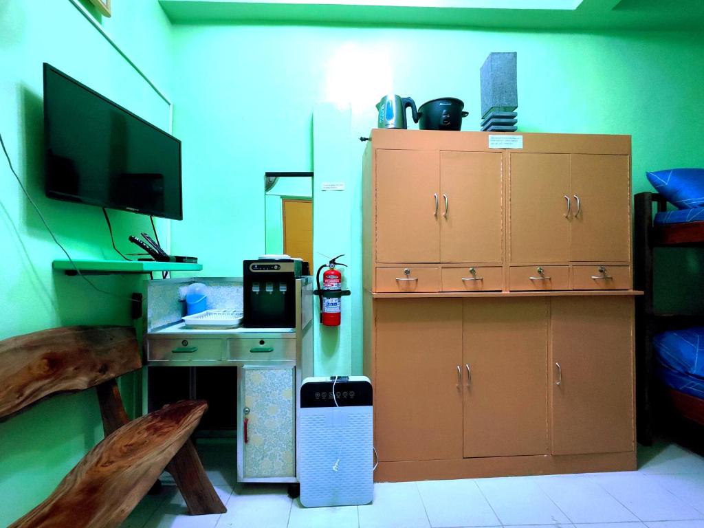 Kuchyň nebo kuchyňský kout v ubytování Evan's Homestay