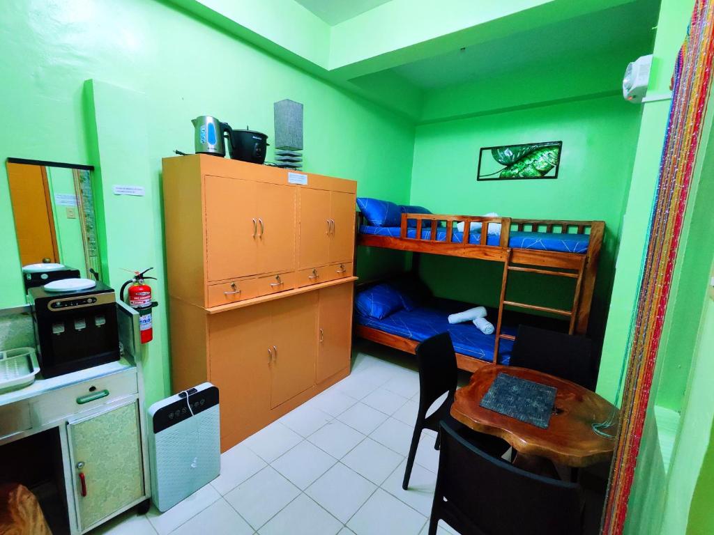 Kuchyň nebo kuchyňský kout v ubytování Evan's Homestay