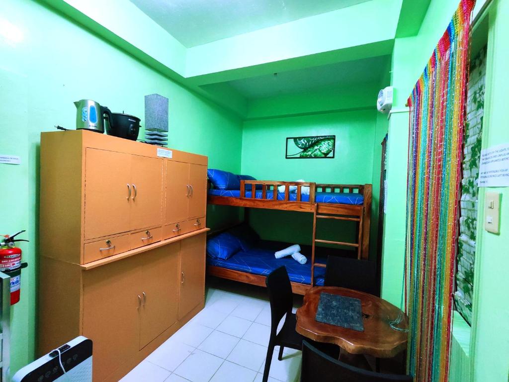 TV a/nebo společenská místnost v ubytování Evan's Homestay