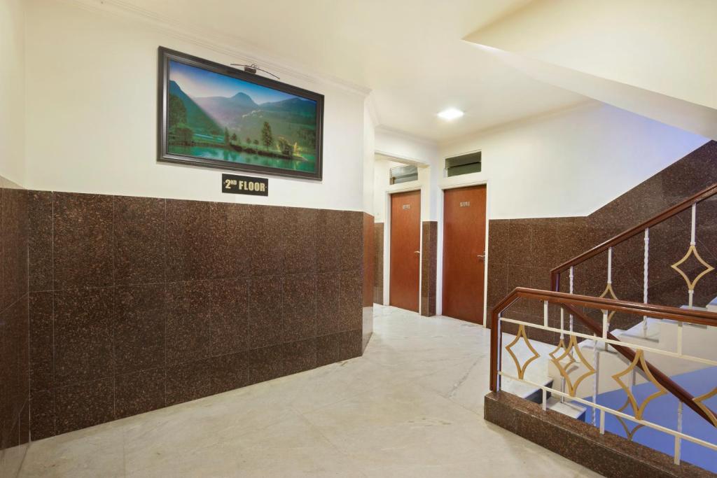 TV a/nebo společenská místnost v ubytování Mannars Yatri Nivas Hotel