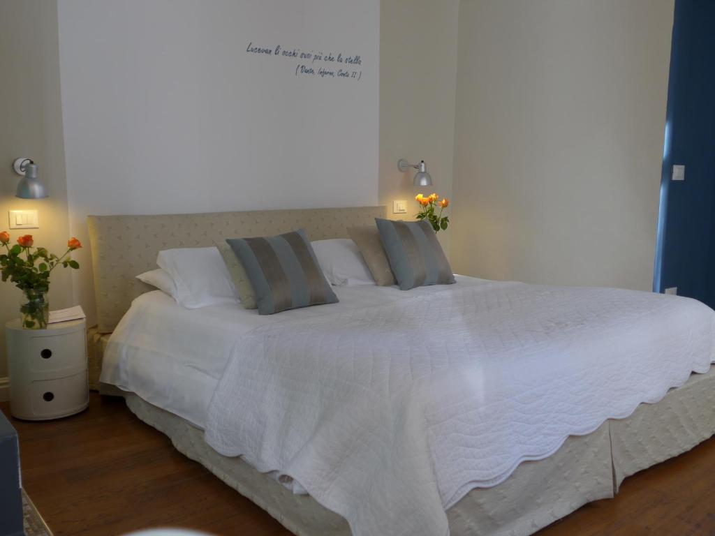Postel nebo postele na pokoji v ubytování B&B Casa Fenoglio