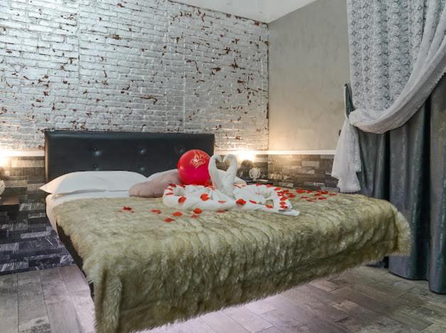 Posteľ alebo postele v izbe v ubytovaní Sicily Suite