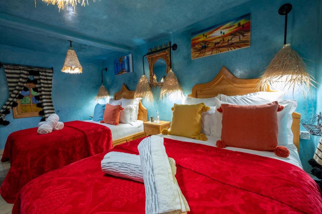 Cama ou camas em um quarto em Riad Mosaic