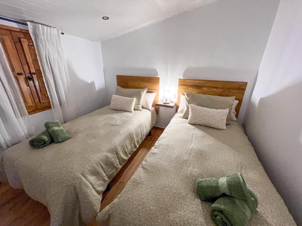 Postel nebo postele na pokoji v ubytování Casa La Buganvilla