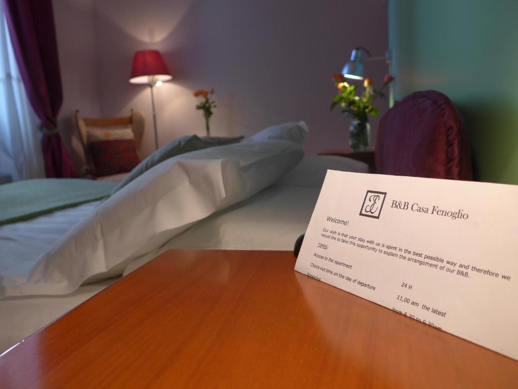 Postel nebo postele na pokoji v ubytování B&B Casa Fenoglio