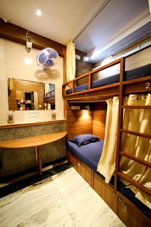 Postel nebo postele na pokoji v ubytování MAPLE SOCIAL HUBZ-HOSTEL