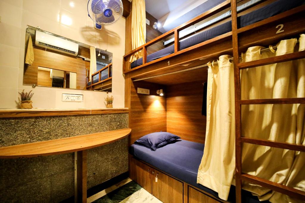 Postel nebo postele na pokoji v ubytování MAPLE SOCIAL HUBZ-HOSTEL