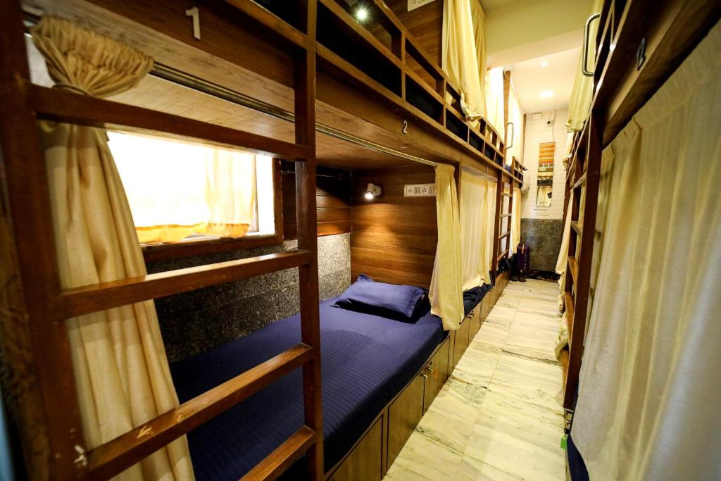 Postel nebo postele na pokoji v ubytování MAPLE SOCIAL HUBZ-HOSTEL