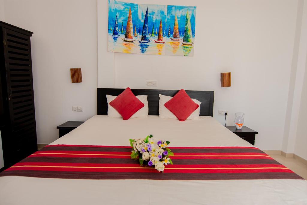 Letto o letti in una camera di Nico Beach Hotel