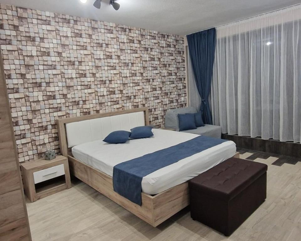 Postel nebo postele na pokoji v ubytování B55 Studio