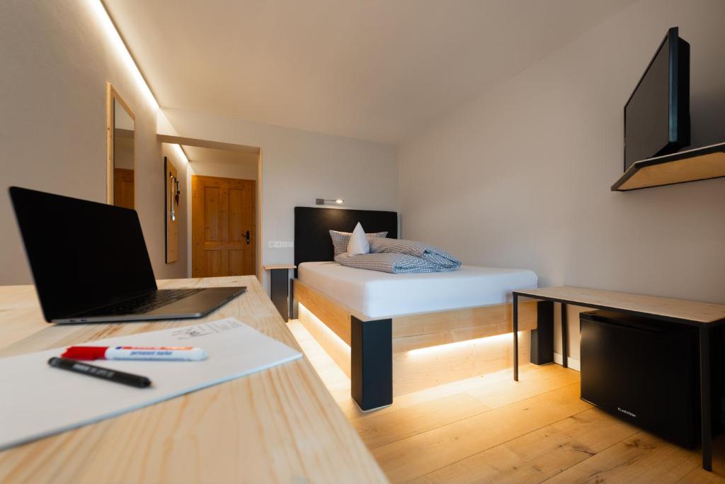 TV a/nebo společenská místnost v ubytování freistil Boutiquehotel