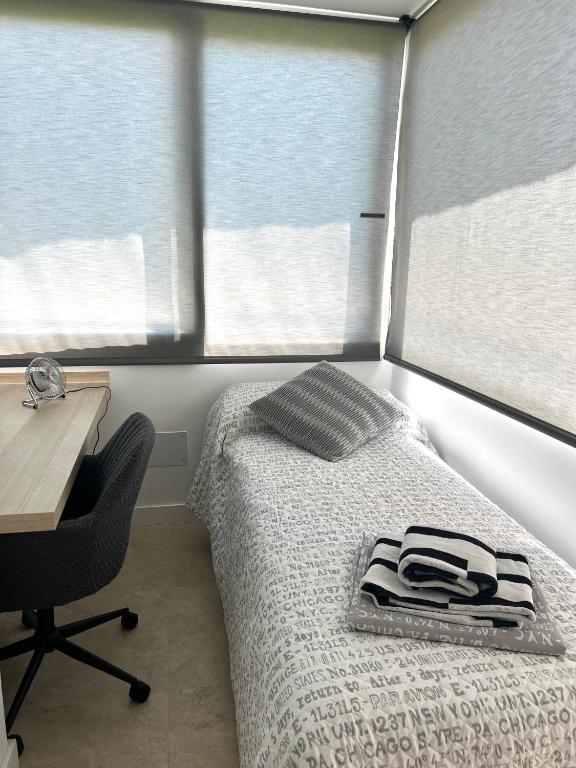 Posteľ alebo postele v izbe v ubytovaní Modern 3 bedroom apartment situated in luxury beachfront gated community