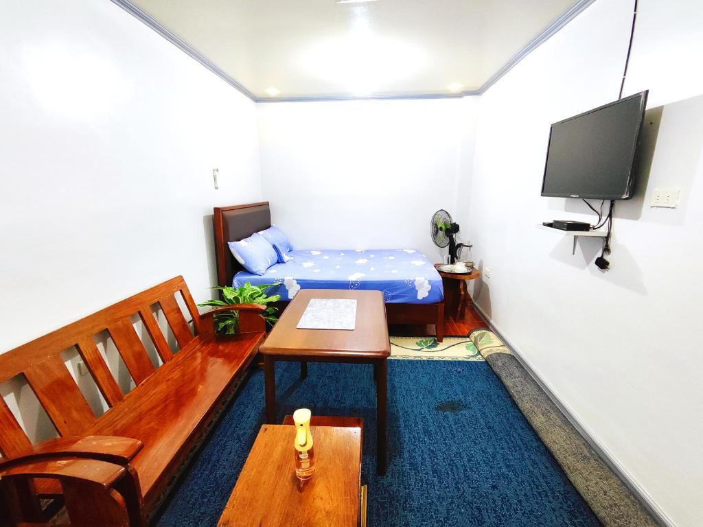TV a/nebo společenská místnost v ubytování Evan's Homestay