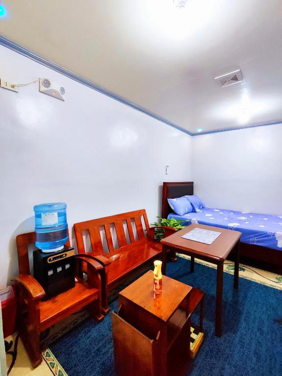 Postel nebo postele na pokoji v ubytování Evan's Homestay