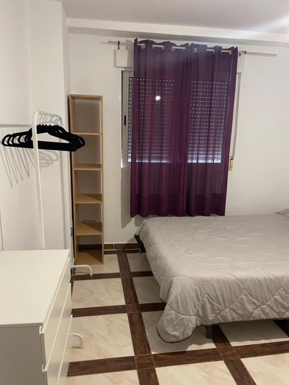 Postel nebo postele na pokoji v ubytování Apartamento de 2 dormitorios cerca Paseo Marítimo